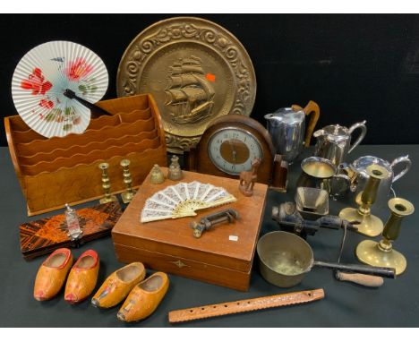 An oak desk top stationery letter rack;  work box;  Clock;  pair of brass candlesticks;  four piece silver plated tea set etc