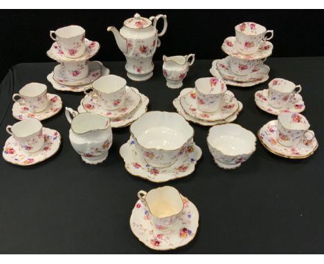 An Aynsley floral decorated part tea and coffee set inc coffee pot, cream and milk jugs, sugar bowls, cups, saucers, side pla