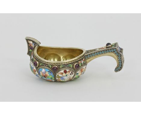 A Russian silver gilt, enamel and jewelled kovsh, circa 1908-1917, the bowl of lobed form with floral panels, 9cm long/see il