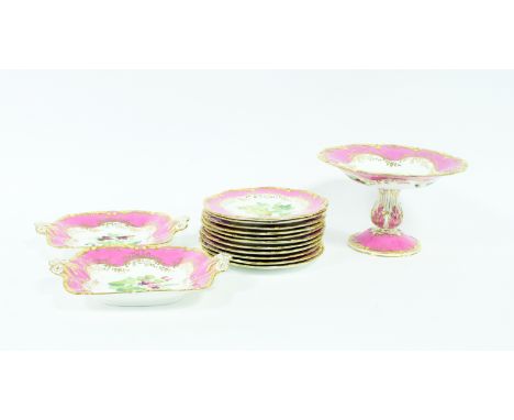 A Coalport botanical dessert service, circa 1840, each piece centred by a hand painted botanical study within a pink border, 