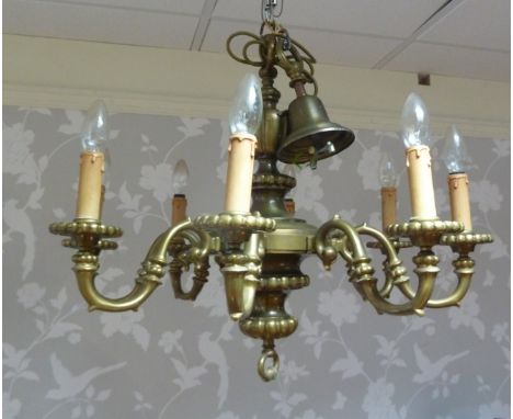 An eight-light electrolier with scroll branches, 56cm high