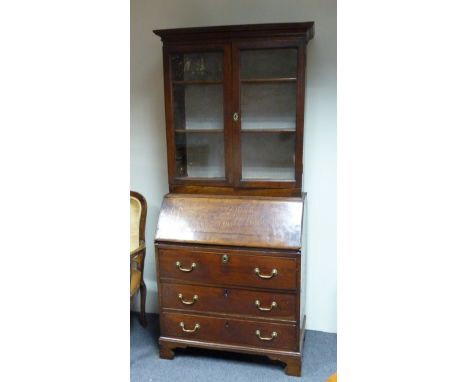 A late 18th Century bureau with bookcase over, fitted three drawers on bracket feet, 90cm wide