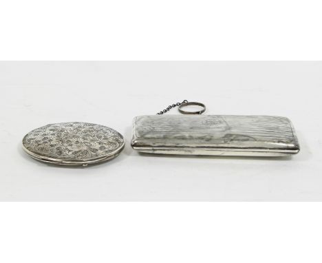 A lady's silver evening bag, W N Ltd Birmingham, 1916, with engine turned decoration, monogrammed and a plated compact, appro