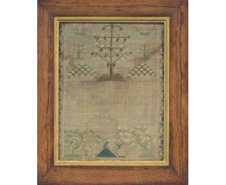 A Georgian needlework sampler worked by Harriet Thomas aged 9, dated 1823, in a rosewood frame, 33.5cm x 25.5cm, a small mode