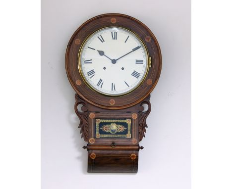 A late 19th Century drop head wall clock, the walnut case inlaid Celtic cross and with stained glass panel to the pendulum do