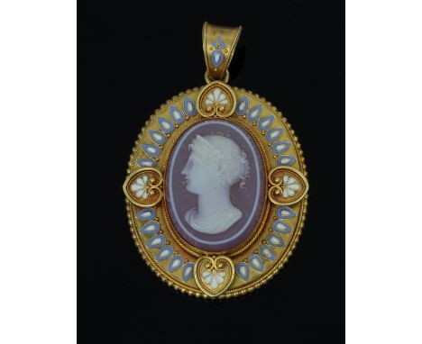 A Victorian gold and enamel hardstone cameo pendant, late 19th Century, the oval shaped hardstone cameo carved as a classical