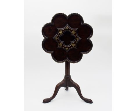 A George II mahogany supper table, attributed to Frederick Hintz, the octofoil top inlaid brass lines and with quatrefoil dis