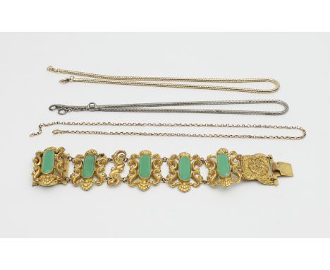 A Victorian gilt and green glass bracelet, mid 19th Century, each scrolled openwork plaque millegrain set with oval green gla