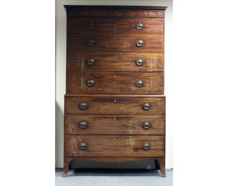 A George III chest on chest, fitted two short over six long drawers, on splay bracket feet, 210.75cm high