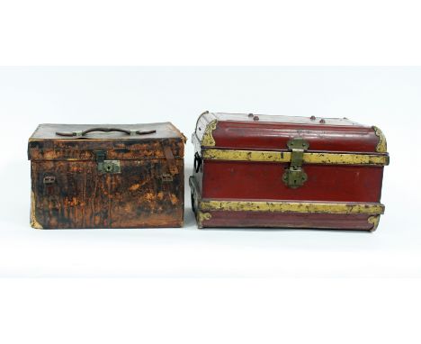 A leather trunk by Drew & Co., London, 45cm wide and a painted tin trunk