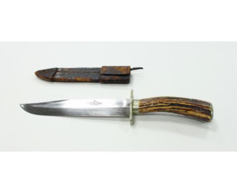 An Underwood 'Bowie Knife', 16 Haymarket, London, with antler handle in a leather scabbard, 34cm long