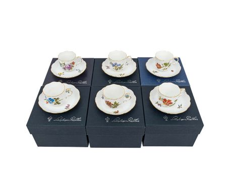 LUDWIGSBURG, “sechs Mokkatassen mit Untertassen“, 20. Jh., Porzellan polychrom bemalt, goldstaffiert. Originalverpackt.| LUDW