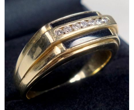YELLOW METAL AND DIAMOND RING, SIZE T, A BAR SHAPED DESIGN SET SEVEN DIAMONDS, 6.2 GRAMS 