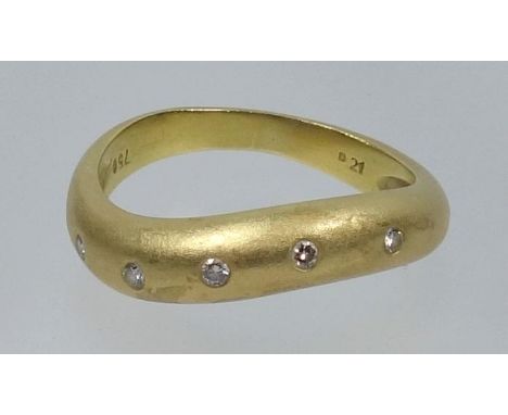 YELLOW METAL RING SET FIVE SMALL DIAMONDS,  SIZE Q, STAMPED 750, 5.2 GRAMS 
