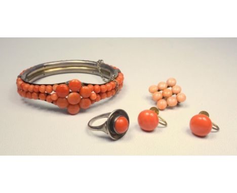 WHITE METAL HINGED BRACELET STAMPED 'EW 800' ENCRUSTED WITH CORAL, 25.9 GRAMS, A PAIR OF CORAL EARRINGS WITH SCREW BACKS STAM