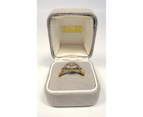 YELLOW METAL RING (SIZE J 1/2) SET MARQUISE CUT DIAMOND, 1/4 CT APPROX. AND 12 SMALLER DIAMONDS, 3.7 GROSS 