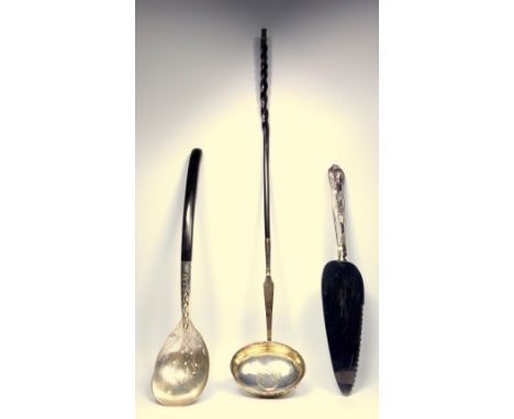 GEORGE III SILVER PUNCH LADLE, THE OVAL BOWL INSET WITH A SHILLING, 1758, WITH A WHALEBONE HANDLE (L. 41.8 CM), EASTERN WHITE