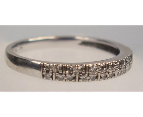 WHITE METAL AND DIAMOND HALF ETERNITY RING STAMPED 375, SIZE R 1/2, GROSS WEIGHT 2.3 GRAMS 