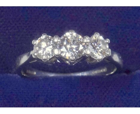 PLATINUM RING, SIZE L, SET THREE DIAMONDS, 0.75 CTS APPROX., GROSS WEIGHT 3.8 GRAMS 