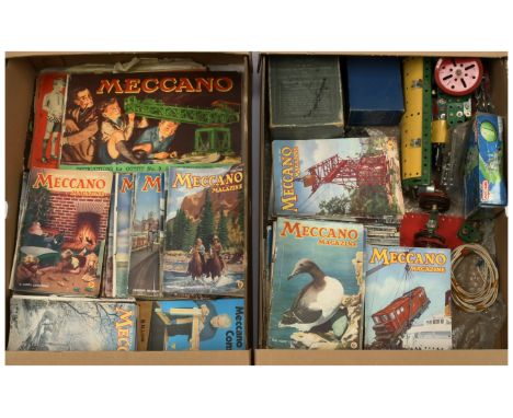 Meccano group of parts and magazines - A mix of parts, partially built to make a traction engine, Transformer and electric mo