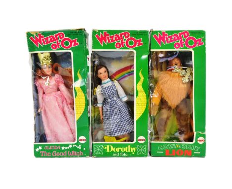 The Wizard Of Oz - Mego - three vintage c1974 Mego made Wizard Of Oz action figures: Dorothy &amp; Toto, Cowardly Lion, and G