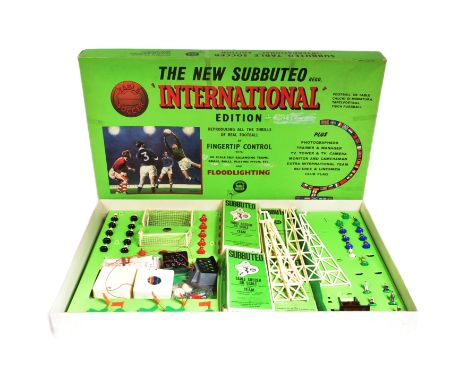 An original vintage Subbuteo International Edition tabletop football game set. The set containing pitch, players, goals, ball