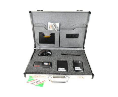 Mission Impossible - a Mission Impossible secret agent spy kit containing a Mini Radio, Olympus Microcassette Recorder, Binoc