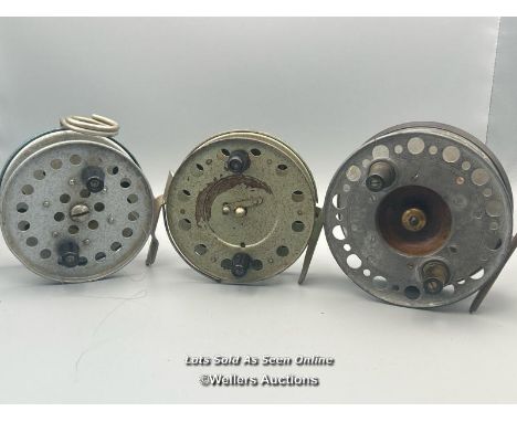 Three vintage alloy reels including Eaton Sun and two unbranded, largest 10cm diameter.