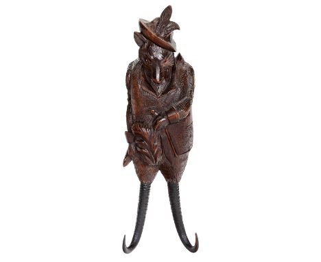 Geschnitzter musikalischer Kleiderhaken, um 1890Emil Schürch, Schweiz. Darstellend einen anthropomorphen Fuchs im Jägerkostüm