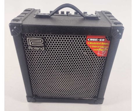 A Roland Cube 60 guitar amplifier. A 60 Watt modelling amp, S/N CV100XX.(This lot has not been PAT tested)