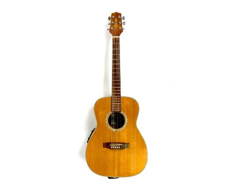 A 'Takamine' G Series 'EG501S' electro acoustic guitar, Finish: natural.The guitar is in good playing condition and the elect