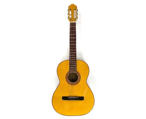 A 'Miguel Angel, S.L.' Empressa Artesana Nº 121 classical guitar. Includes a 'Wings' padded soft case.