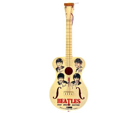 A 'Beatles' New Sound Guitar. Manufactured by Selcol in the early 1960s, includes the original sticker (loosely affixed).