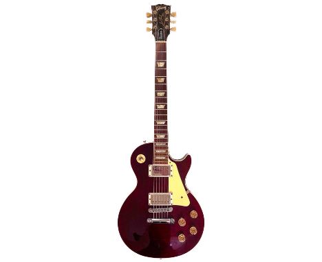 A 1994 'Gibson' Les Paul electric guitar. Finish: Wine Red, made in U.S.A, includes original hardcase, S/N 94010XXX.The guita