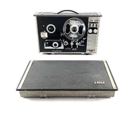 An 'Akai' ST-1 reel-to-reel tape recorder. Includes user manual.(This lot has not been PAT tested)