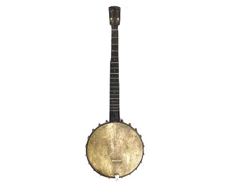 An early 20th century American made banjo With a lovely hammered bracket band and patinated head skin, missing 5th string tun