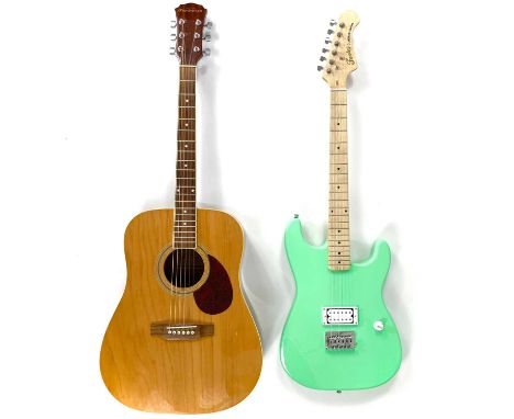 Two guitars. A Fazley Classic series electric guitar with a single humbucker pickup, Finish: Surf Green, and a Freshman FA1DN