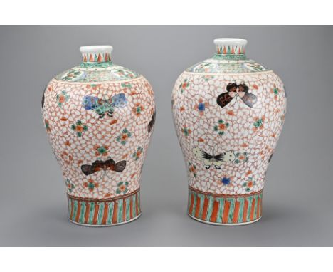 A PAIR OF CHINESE FAMILLE VERTE PORCELAIN MEIPING BUTTERFLY VASES. Each decorated with a cracked ice pattern with butterflies