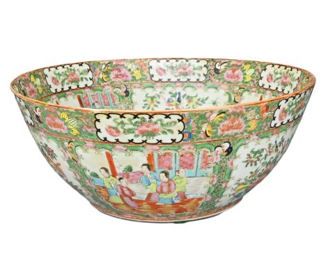 A LARGE CHINESE CANTONESE FAMILLE ROSE PORCELAIN PUNCH BOWL. Rose medallion decoration of figures and floral scenes. 40.5cm d