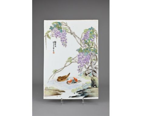 A VINTAGE CHINESE PAINTED PORCELAIN TILE, 20TH CENTURY. Depicting Mandarin dusks in pond with overhanging flowering branches 