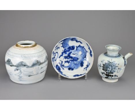 THREE CHINESE BLUE AND WHITE PORCELAIN ITEMS, 17/18TH CENTURY. To include a dragon dish, Yongzheng period; a ewer and ginger 