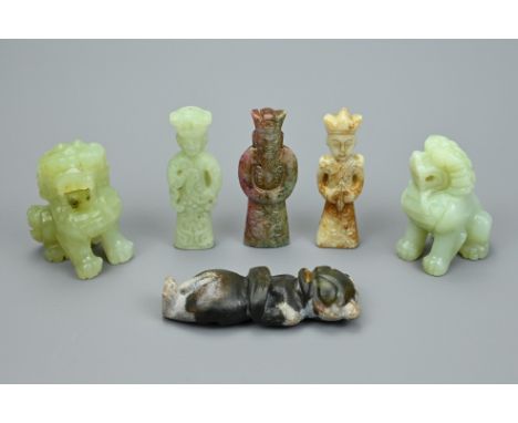 A GROUP OF CHINESE STONE CARVINGS AND FIGURES. To include a pair of seated lion dogs, three standing figures, together with a