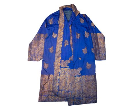 AN ANTIQUE VINTAGE INDIAN / MIDDLE EASTERN EMBROIDERED ROBE. Blue ground with gold coloured thread work floral decoration. 11