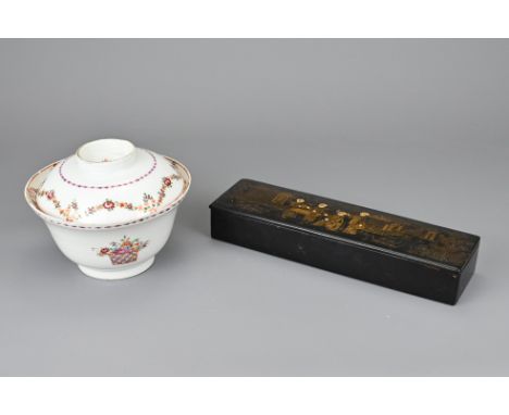 A CHINOISERIE BLACK LACQUER AND GILT PEN BOX WITH CHINESE PORCELAIN BOWL AND COVER. The black pen box with gilt decoration of