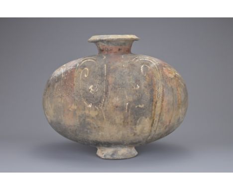 A CHINESE PAINTED GREY POTTERY COCOON JAR, HAN DYNASTY (206BC -220AD). Well potted with scroll work and banded decoration in 