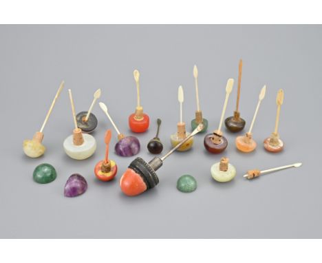 A QUANTITY OF SNUFF BOTTLE TOPS / STOPPERS. Various shapes to include jade, quartz, coral etc. (17) afProvenance: Property of