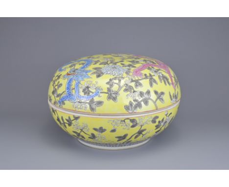 A LARGE CHINESE PORCELAIN DRAGON BOX AND COVER. Yellow-ground with grisaille floral decoration with blue and pink enamel drag