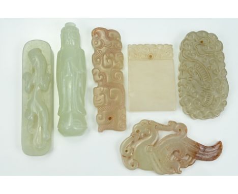 SIX CHINESE JADE PENDANTS. Of various forms to include a standing figure of Buddha and others. 4cm - 6.5cmAll good condition.