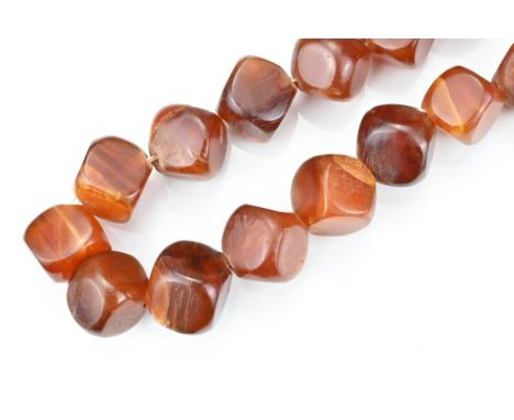 A VINTAGE CARVED HORN NECKLACE. Carved into twenty-five cubes with screw clasp. 46cm total length.Overall good general condit