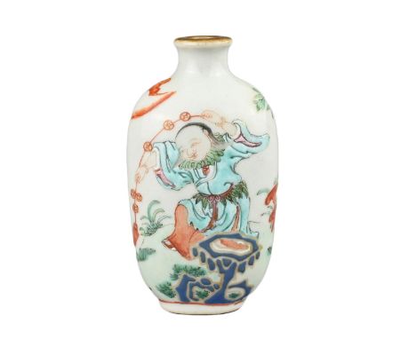 A CHINESE PORCELAIN SNUFF BOTTLE, LATE 19TH CENTURY. Decorated in polychrome enamels and iron-red with figure of Liu Hai and 